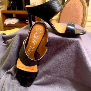 Calvin Klein black patent/snake pattern mule heel